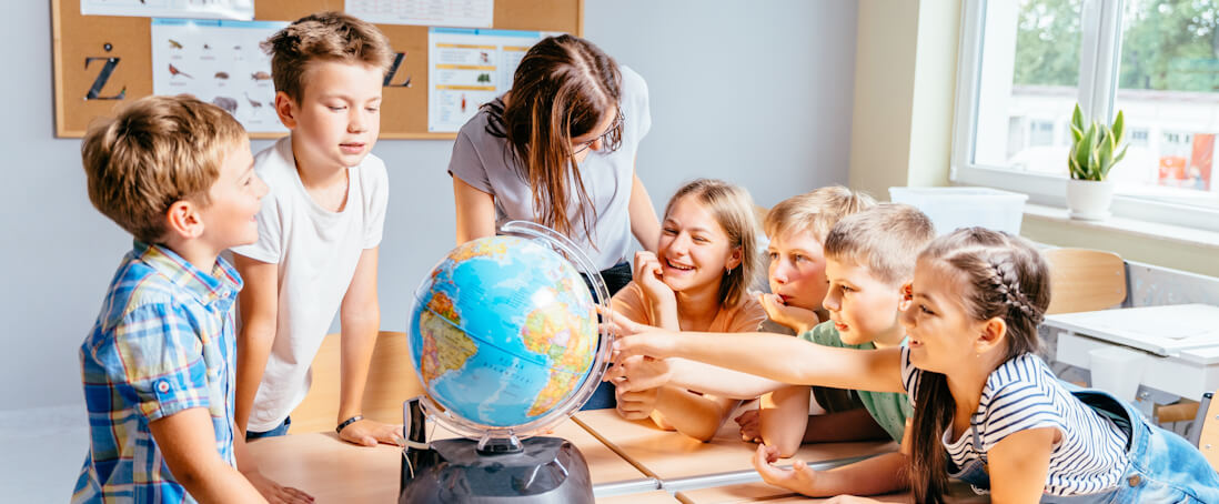School children with a globe