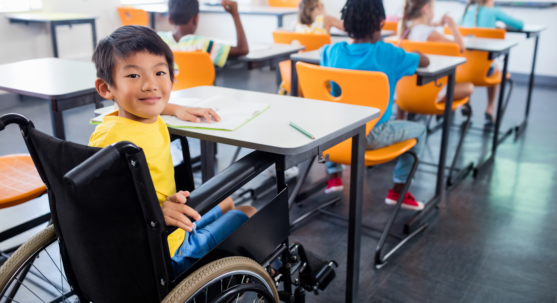 learner using a wheelchair in a classroom