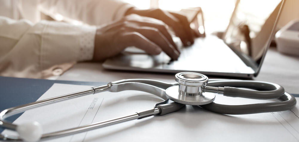 Healthcare, stethoscope, and laptop